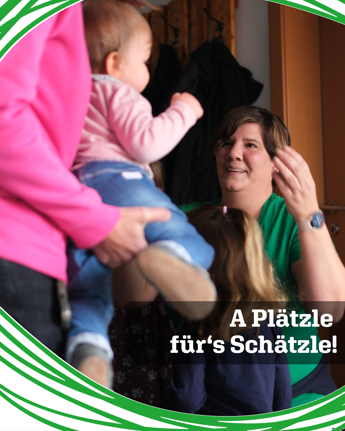 Caregiver smiling and talking to a child being carried, on a promotional banner that says 'A Plätzle fürs Schätzle!'